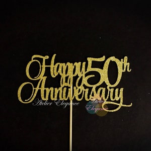 May include: Gold glitter cake topper with the text "Happy 50th Anniversary".