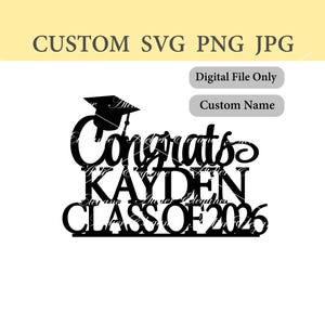 May include: Black graduation cake topper with the word "Congrats" in a script font, the name "Kayden", and "Class of 2026". A graduation cap is above the word "Congrats". The text "Custom SVG PNG JPG" is at the top.