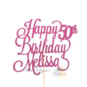 May include: Pink glitter cake topper with the text "Happy 50th Birthday Melissa".