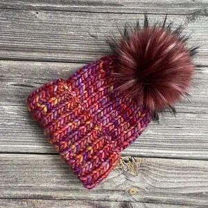 Luxury Handmade Chunky and Super Soft Merino Wool Rib Knitted Pom Pom Beanie Hat in Red / Pink Archangel. Adult size, perfect for gifts.