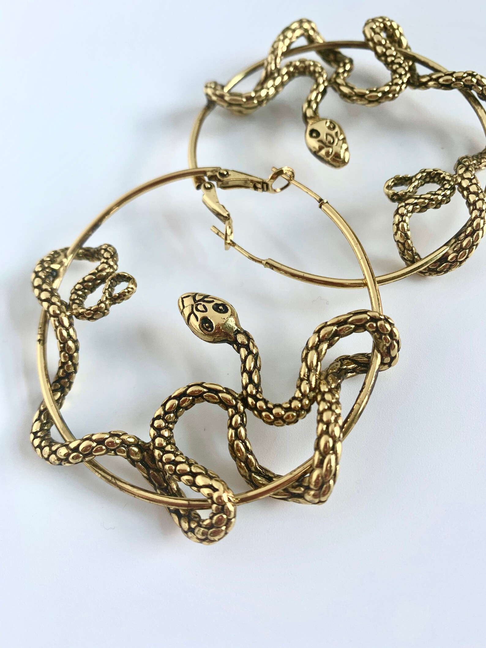 black snake hoop earrings