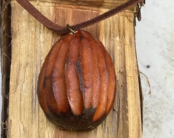 Cornish twist.    handmade Avocado wood celebrate life with this beautiful piece.