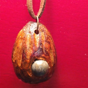 Hand carved avocado seed with stone center. Sensational handmade yep hand carved unique and original only one. image 1