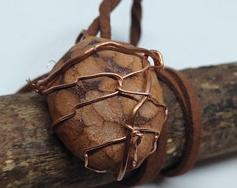 Copper face with hair wrapped Avocado wood . celebrate you with this beautiful piece. Get some. Nature!