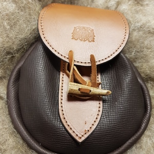 Traditional Multifunctional Belt Pouch with Horn Button Closure & made with Genuine Leather.