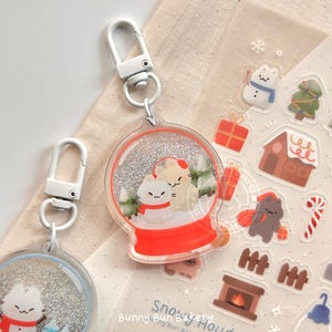 Llavero de bola de nieve de gatito / Dije navideño de acrílico líquido
