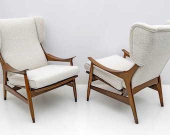 Pair of mid-century modern teak and bouclé armchairs model FM 106 by Framar, 1950s