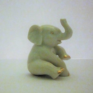 Lenox china baby elephant figurine Lenox elephant with gold accents