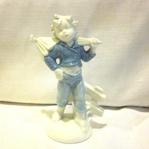 Gerold Porzellan figurine boy by fence blue and white ceramic figurine vintage Gerold Porzellan  Bavaria West Germany