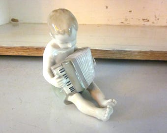 Grafenthal vintage figurine boy with accordion Thuringia Germany collectible musician polka