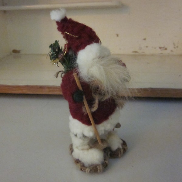 Snowshoeing Santa figurine ornament Christmas decor Santa Claus collectible whimsical kitsch