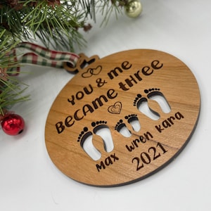 You and me became three. custom new baby ornament 2024. first baby ornament. First baby ornament. Family ornament. new mom and dad ornament. image 8