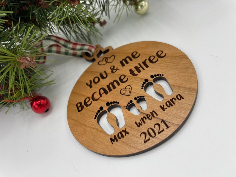 You and me became three. custom new baby ornament 2024. first baby ornament. First baby ornament. Family ornament. new mom and dad ornament. image 8