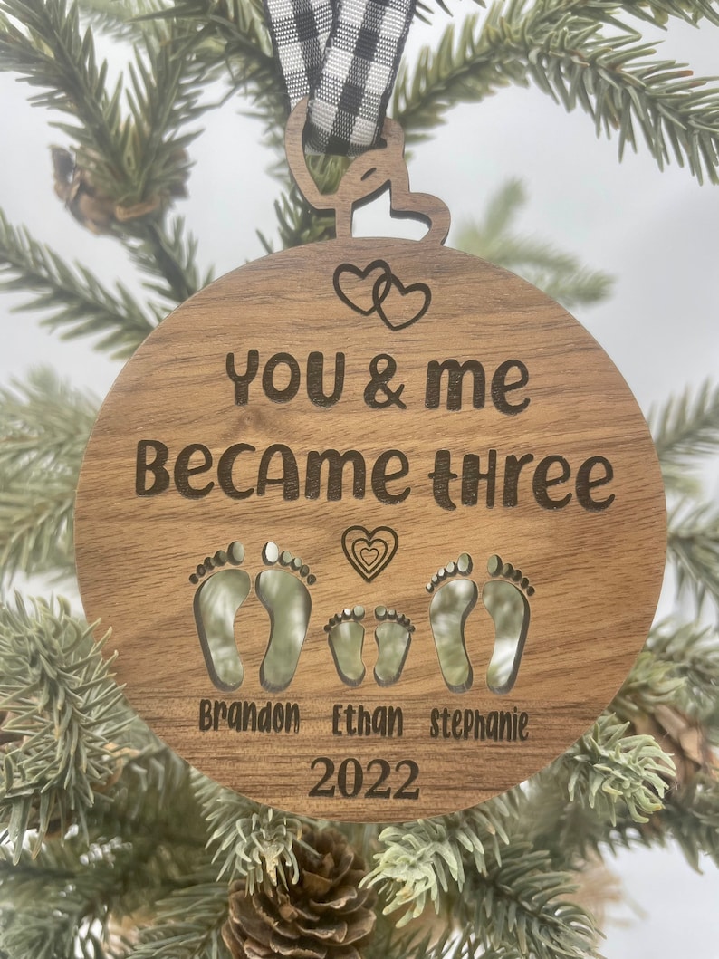 You and me became three. custom new baby ornament 2024. first baby ornament. First baby ornament. Family ornament. new mom and dad ornament. image 4