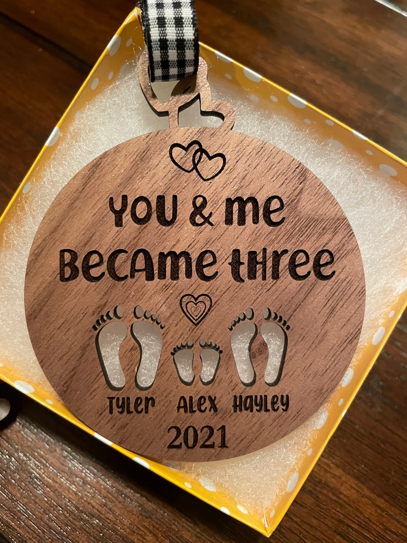 You and me became three. custom new baby ornament 2024. first baby ornament. First baby ornament. Family ornament. new mom and dad ornament. image 6