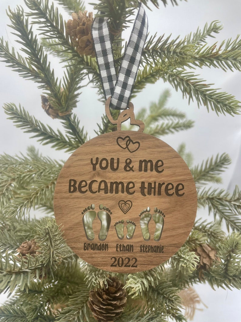 You and me became three. custom new baby ornament 2024. first baby ornament. First baby ornament. Family ornament. new mom and dad ornament. image 2