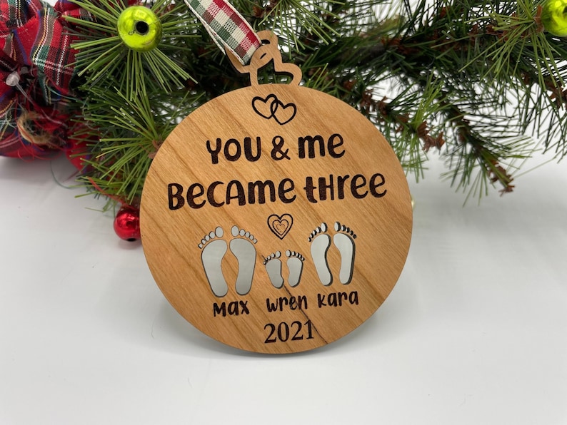 You and me became three. custom new baby ornament 2024. first baby ornament. First baby ornament. Family ornament. new mom and dad ornament. image 5