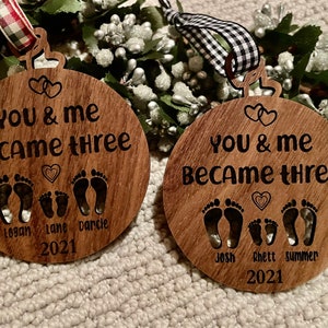 You and me became three. custom new baby ornament 2024. first baby ornament. First baby ornament. Family ornament. new mom and dad ornament. image 7