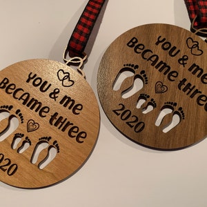 You and me became three. custom new baby ornament 2024. first baby ornament. First baby ornament. Family ornament. new mom and dad ornament. image 9