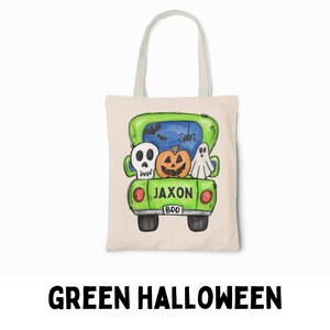 May include: Green Halloween tote bag with a cartoon truck carrying a pumpkin, ghost, and skull. The truck has the name "Jaxon" and "BOO" on the back.