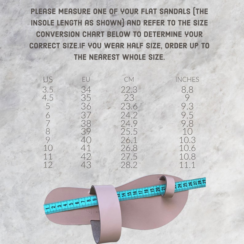 May include: A size chart for sandals, showing US, EU, CM, and inches measurements. The chart is printed on a light grey background. The chart is accompanied by a photo of a pair of pink sandals with a measuring tape.