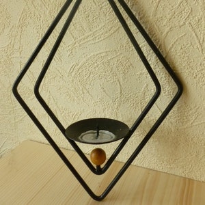 Iron candle holder