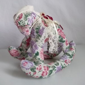 Romantic rocking horse from fabric - With flowers.