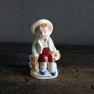 IMPORT Porcelain Boy Figurine