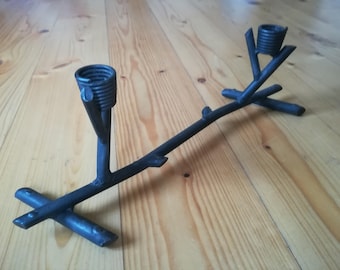 Iron candle holder.
