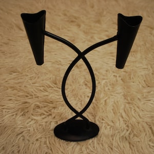 Iron candle holder.