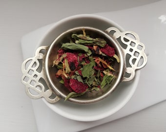 Antiguo colador de té inglés H T & S EPNS INGLATERRA