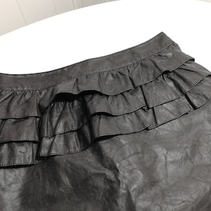 Black leather skirts. - Size 38 - M - 12 UK