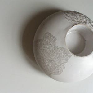 Pottery candleholder.