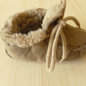 Baby leather slippers.  Size 20-21.,