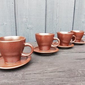 Coffee mugs with a saucer. Midcentury modern design. Set of 4