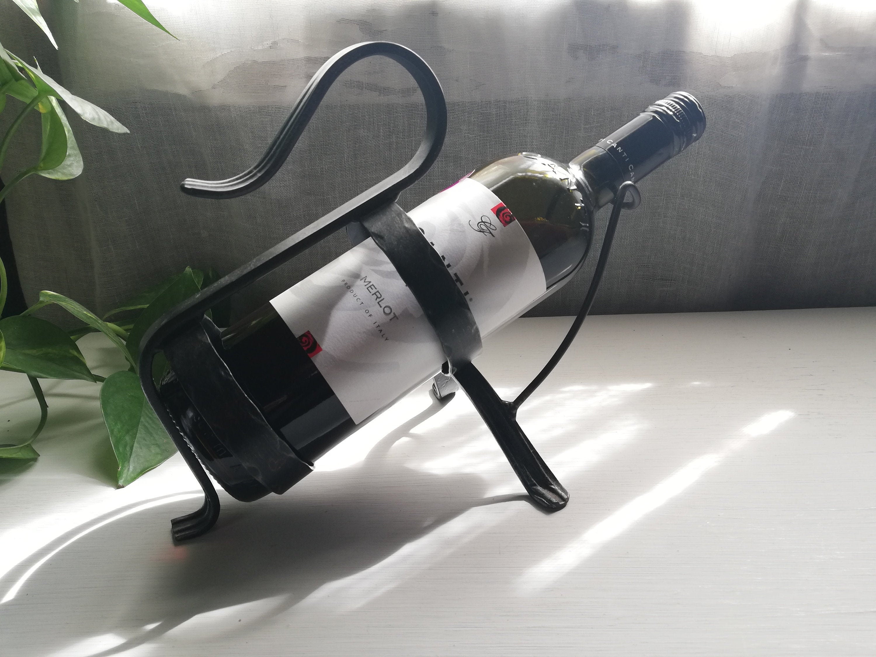 porte-bouteille de vin en fer forgé avec poignée qualité suédoise beau millésime