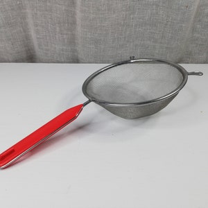 Metal sieve , kitchen strainer - Vintage kitchen utensils.