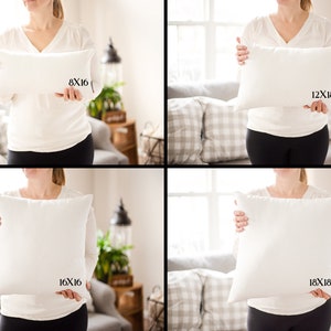 May include: Four white pillows in different sizes are displayed. The sizes are labeled as 8x16 inches, 12x18 inches, 16x16 inches, and 18x18 inches. The pillows are held by a person.
