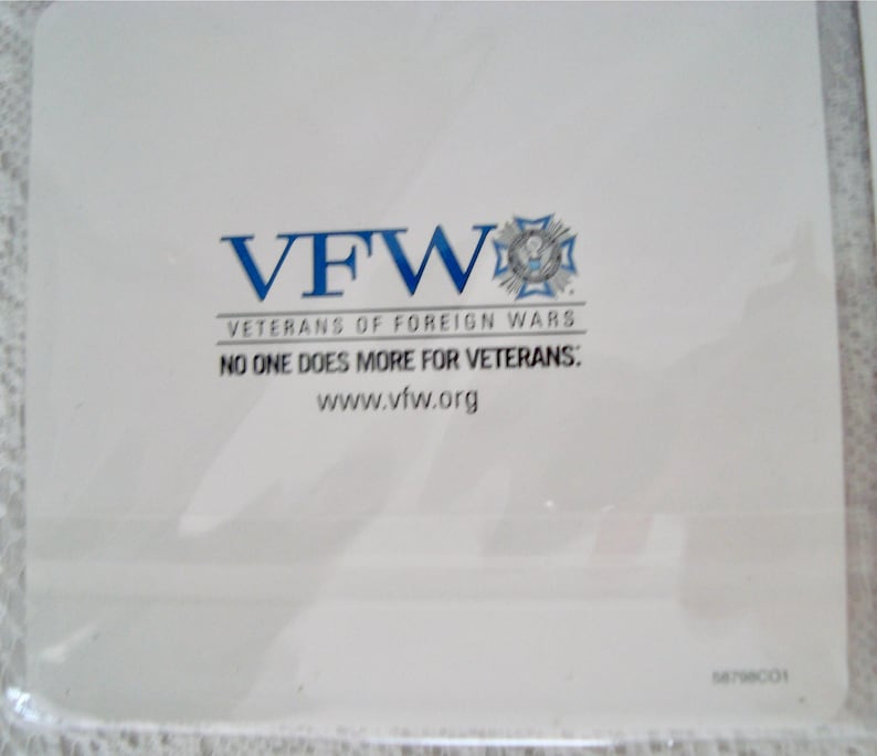 May include: White card with the blue text "VFW" and the words "Veterans of Foreign Wars". Below the text is the phrase "NO ONE DOES MORE FOR VETERANS:" and the website address www.vfw.org.