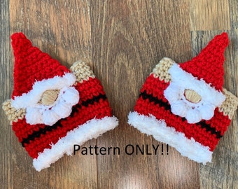 May include: Two crocheted Santa hats with white fur trim, red and black stripes, and a white crocheted face with a brown nose. The text "Pattern ONLY!!" is written below the hats.