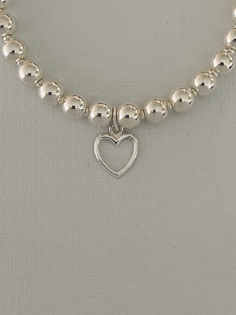 thumbnail image 2 of Inka 925 Sterling Silver Chunky Beaded Stacking Bracelet With Heart Dangle Charm - Nickel-Free, 18cm 2 of 4