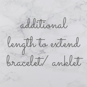 May include: Text on a white marble background that reads "additional length to extend bracelet/anklet"