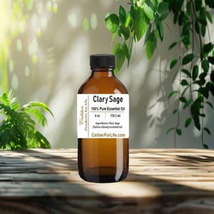 May include: A brown glass bottle of Clary Sage essential oil, labeled "Caliber Products for Life" and "100% Pure Essential Oil". The bottle contains 4 fluid ounces (118.3 ml) of oil.