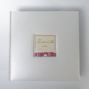 Album de mariage avec carte découpée au laser pour jusqu’à 300 photos