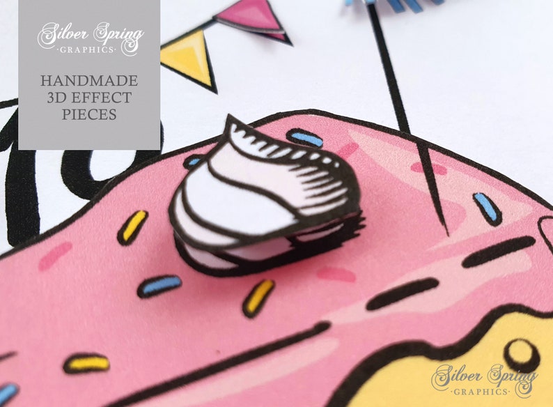 May include: A pink donut with yellow and blue sprinkles and a white frosting swirl on top. The donut is surrounded by a white background with a black outline. The text 'Silver Spring Graphics' is visible in the lower right corner of the image. The text 'Handmade 3D Effect Pieces' is visible in the upper left corner of the image.