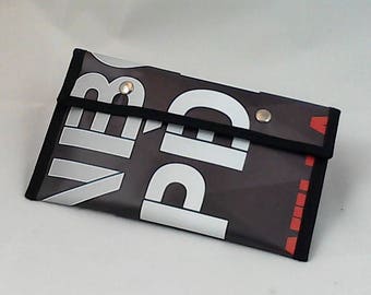 Black pencil/cosmetic case with gray and red lettering