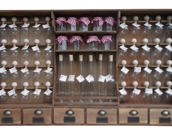 Spice rack with 40 bubbles, 6 oil bottles, and 10 jars. (wood finish)