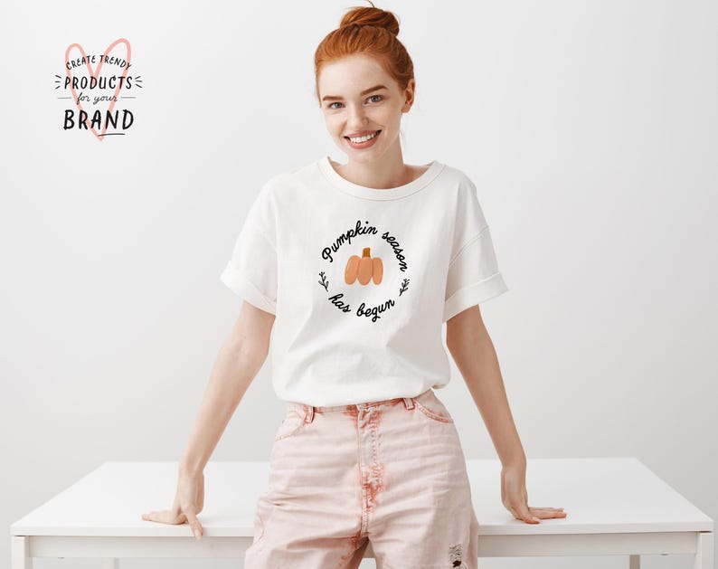 May include: White t-shirt with the text "Pumpkin season has begun" and a graphic of three pumpkins.