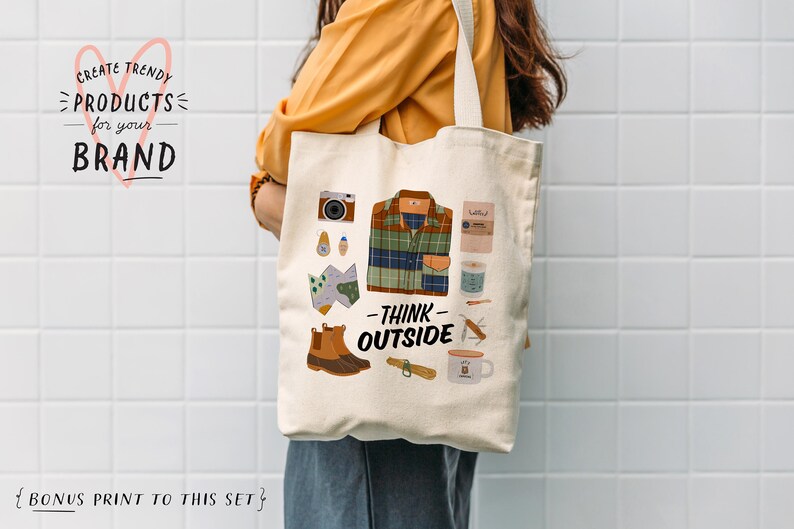 May include: A white canvas tote bag with a graphic design featuring a plaid shirt, boots, a map, a camera, a mug, and the text "Think Outside".
