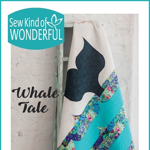 Pode incluir: Um padrão de colcha com um design de cauda de baleia em cores turquesa, branco e preto. O padrão é intitulado "Whale Tale" e faz parte da coleção "Sew Kind of Wonderful". O número do padrão é #435.